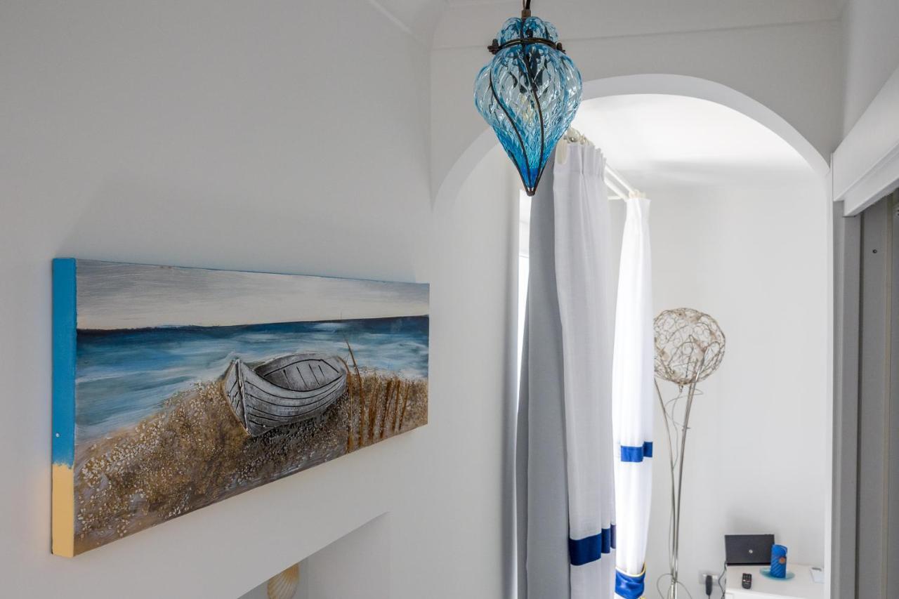 Blue Waves - De Vivo Realty